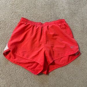 red nike dri-fit athletic shorts, worn a few times, great quality!
